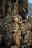 Angkor Thom - Bayon temple, second enclosure, corner towers seen from the central terrace 